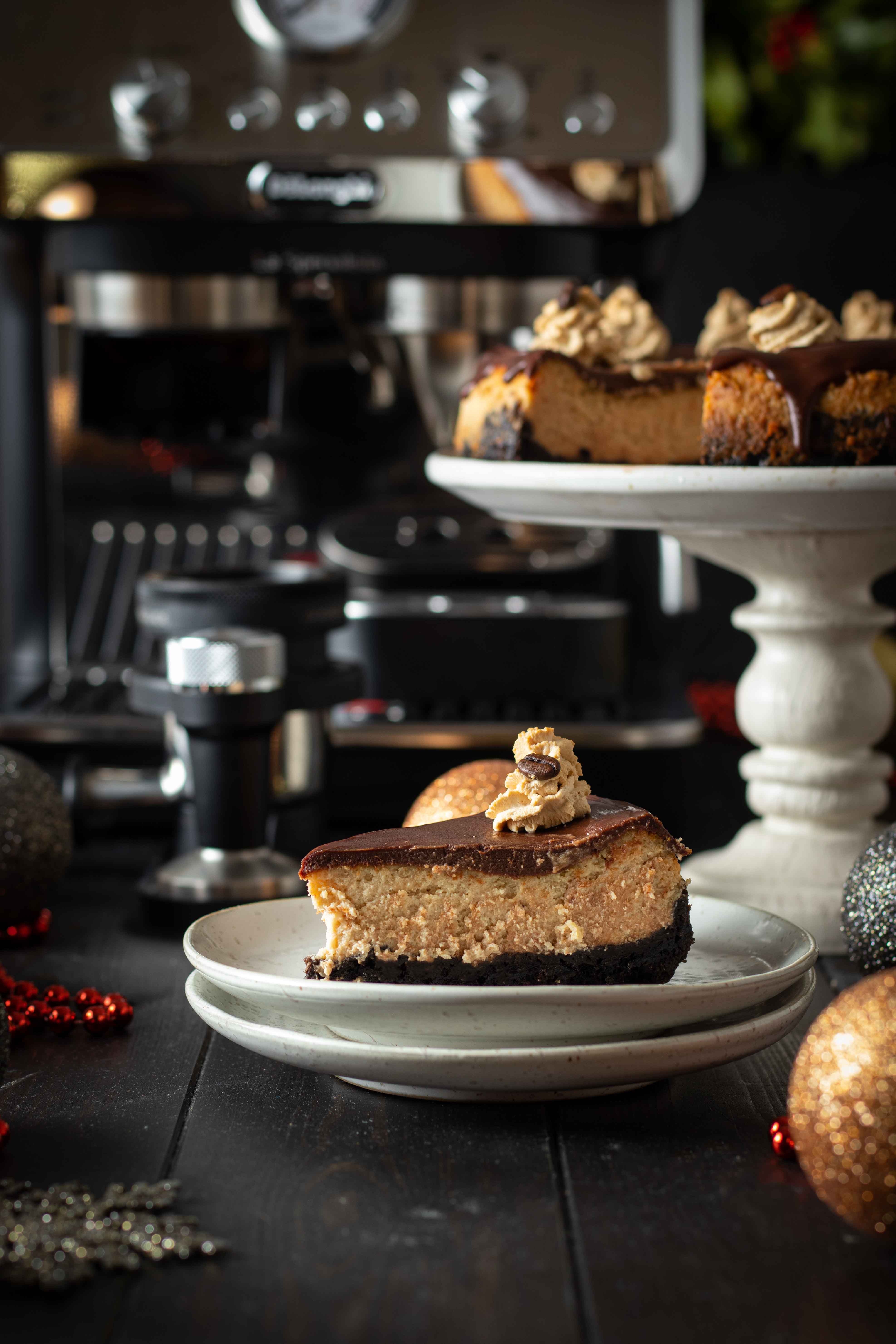 Baked coffee cheesecake with dark chocolate ganache and mocha cream frosting