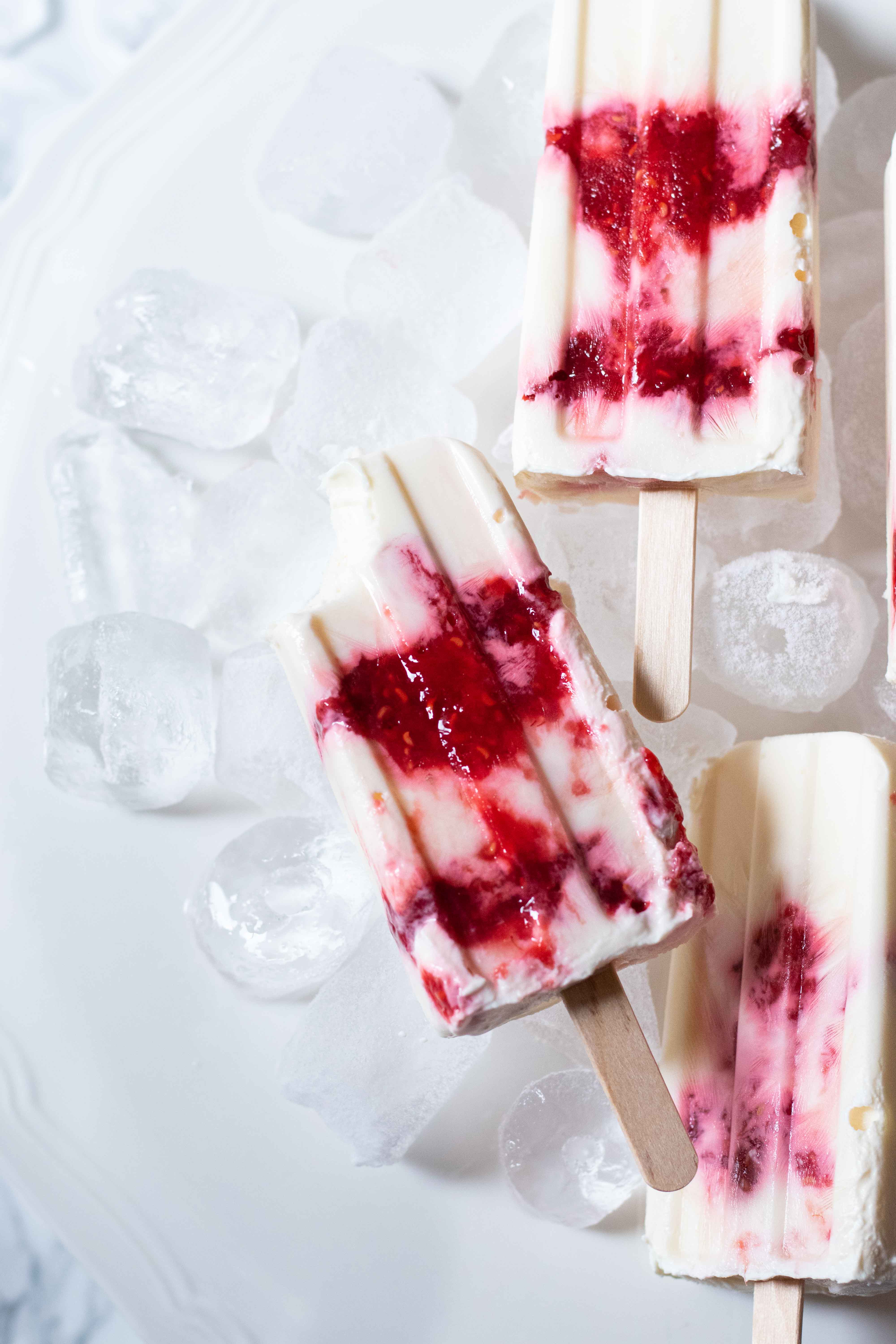 greek yogurt and berry jam popsicles